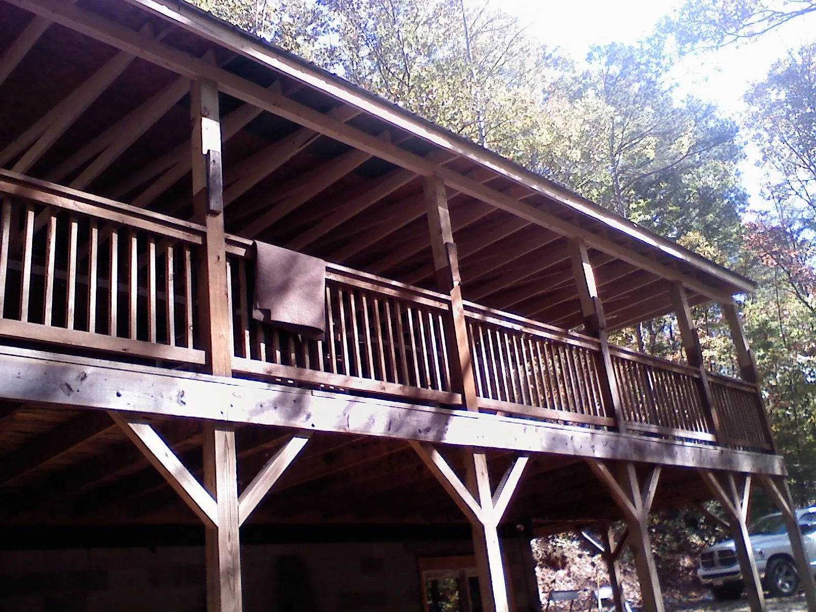Timber framing under a new elevated porch and deck — Roof Leak Repair in Electric City by Roofing Brothers
